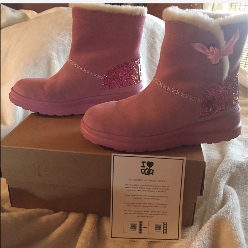 pink UGG australia custom made boots. never worn.